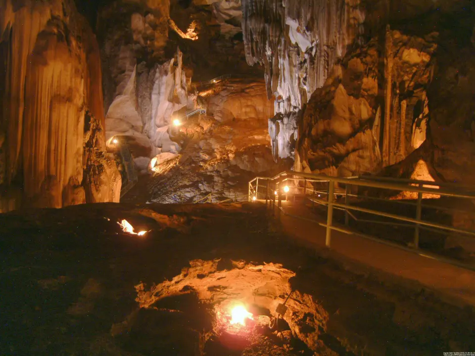 Lamps lighting stalactites inside Gua Tempurung